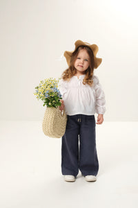 Wide leg linen trousers for kids, offering a breezy and comfortable fit with a stylish wide-leg design