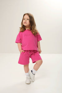 Oversized crewneck t-shirt for kids, featuring a relaxed fit and casual style